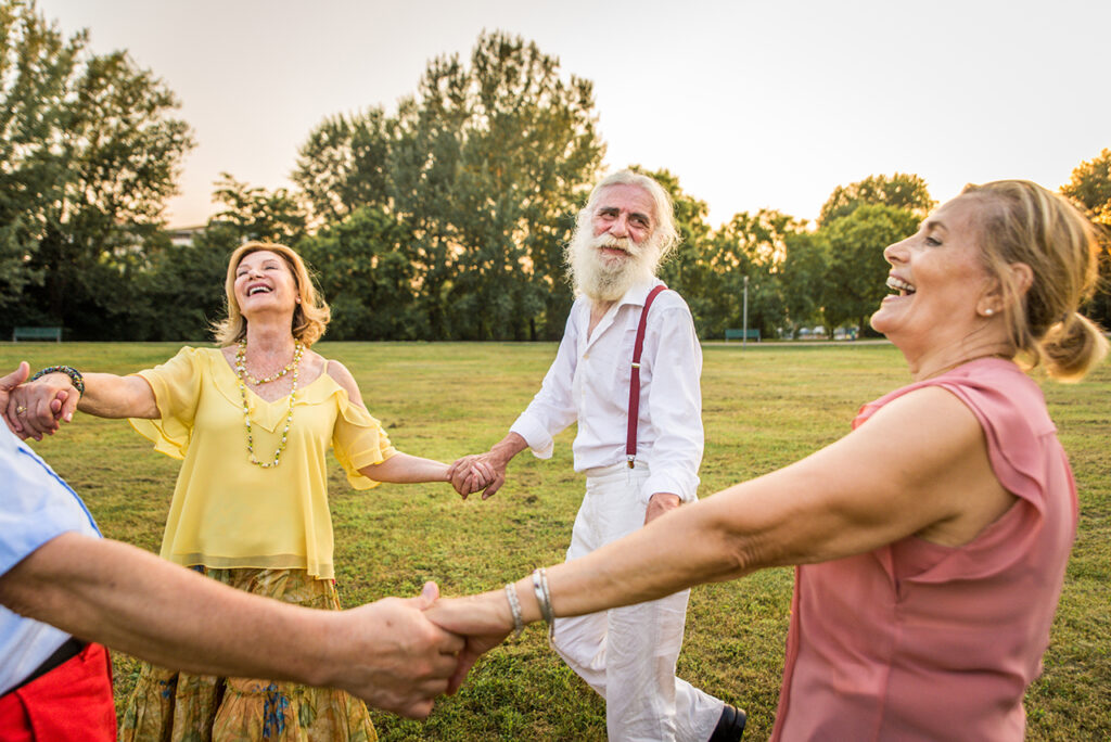Group of senior people bonding outdoors zupa