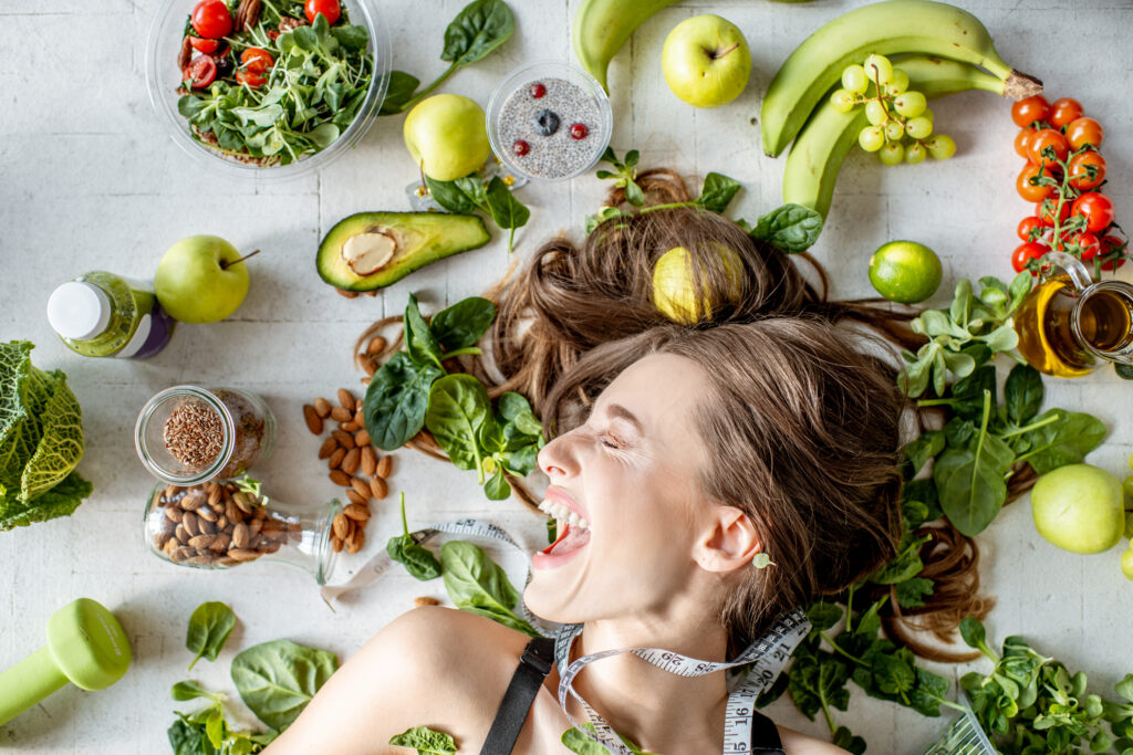 Portrait of a beautiful woman with healthy food zupa